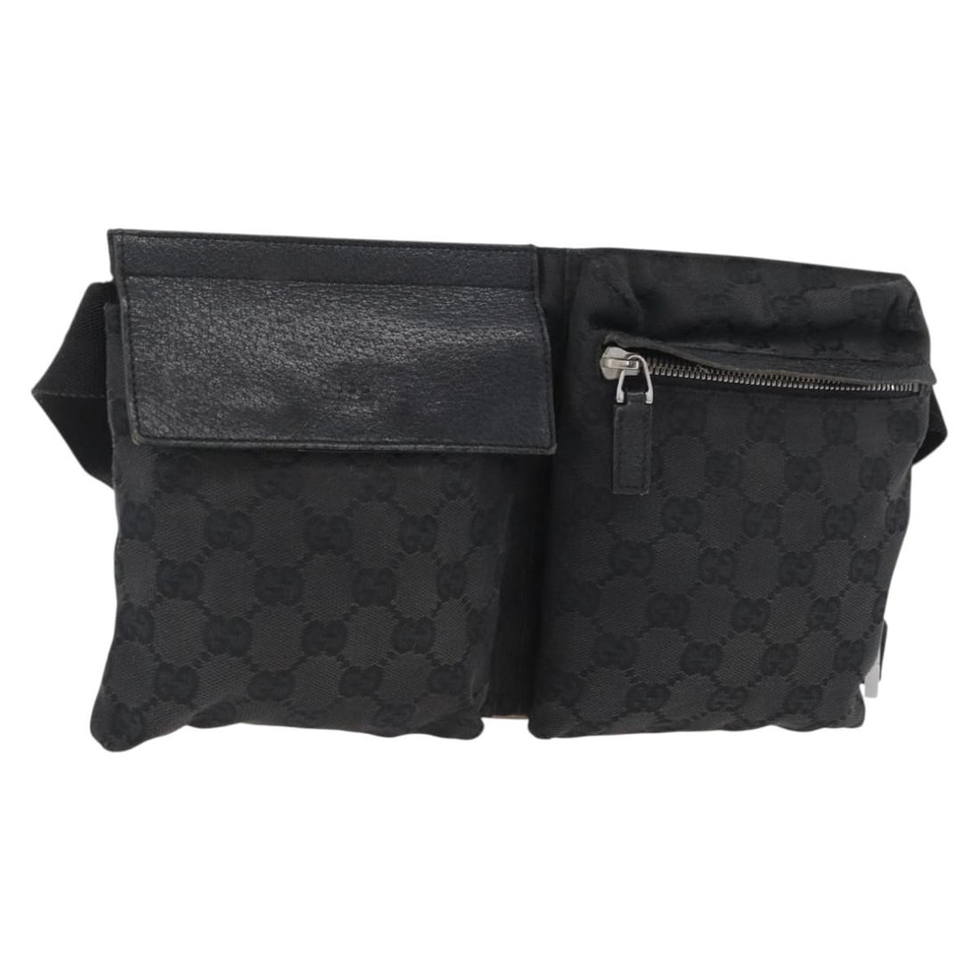 Black GG Canvas Gucci Waist Bag with Silver Accents Model 28566: Black GG Canvas Gucci Waist Bag with Silver Accents Model 28566 This is a Gucci GG Canvas waist bag in black and silver. Crafted in Italy, it features the signature GG canvas exterior with coordinatin