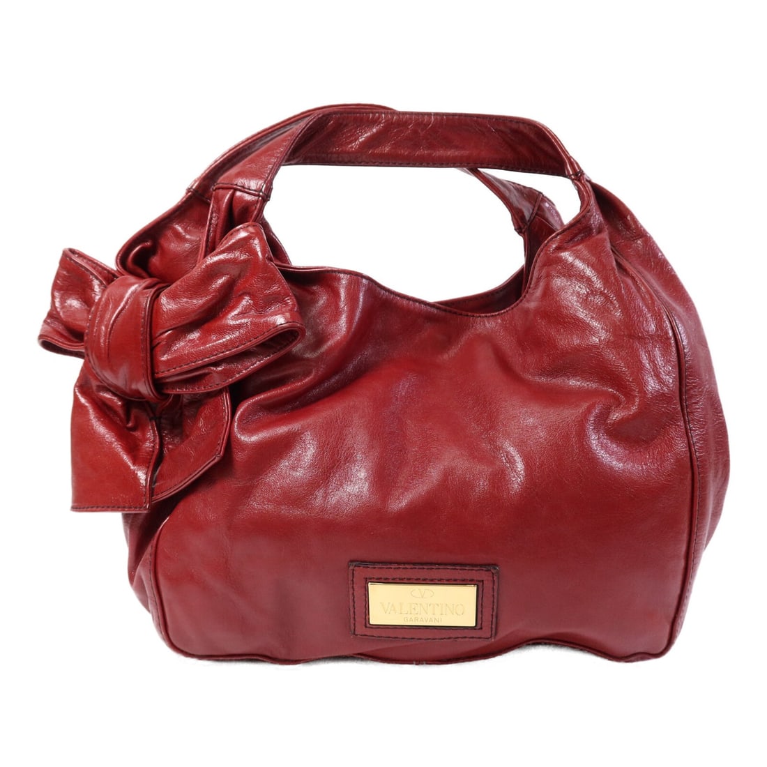 Valentino Red Calfskin Leather Shoulder Bag with Gold Hardware: Valentino Red Calfskin Leather Shoulder Bag with Gold Hardware This Valentino shoulder bag features supple red calfskin leather, designed with a classic silhouette. Made in Italy and intended for wome
