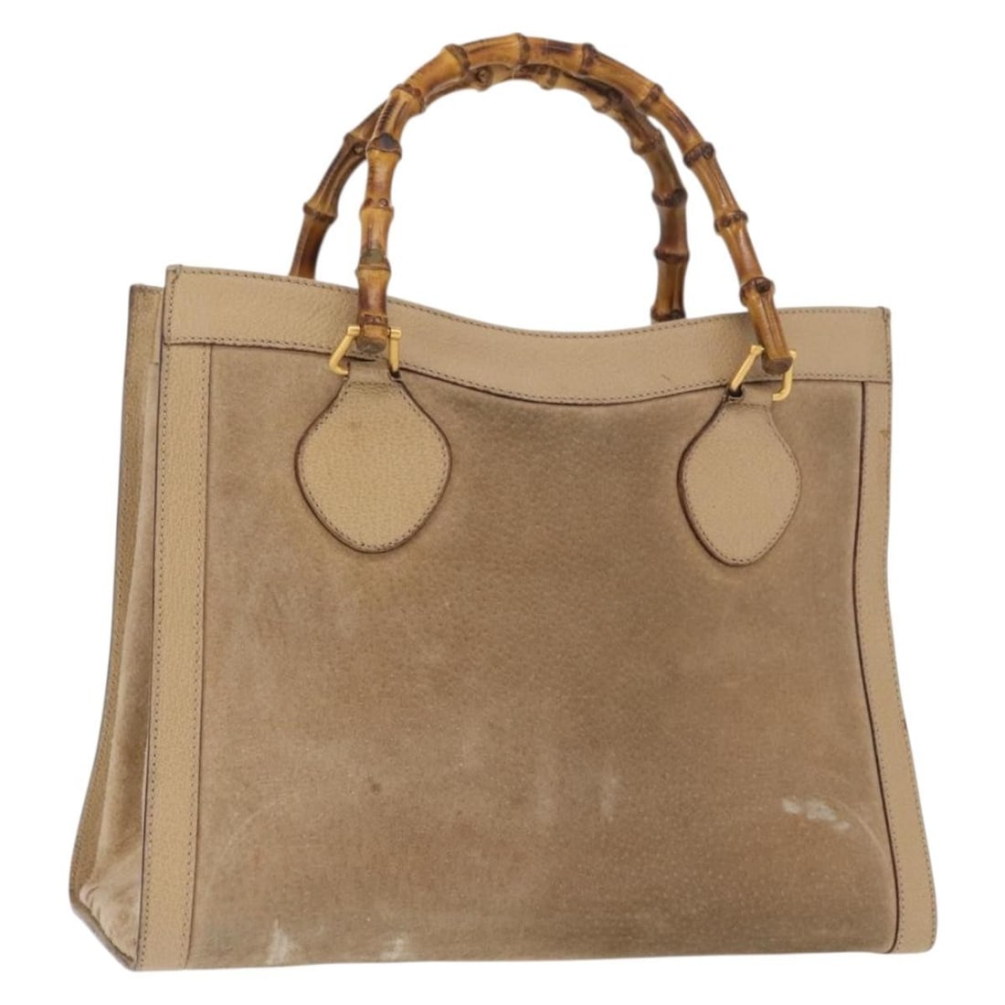 Beige Suede Bamboo Top Handle Purse by Gucci 002 1186 0260: Beige Suede Bamboo Top Handle Purse by Gucci 002 1186 0260 This is a Gucci Bamboo hand bag crafted from beige suede with gold-tone accents. Designed for women, it features a distinctive bamboo handle