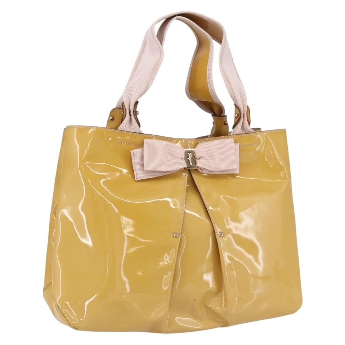 Salvatore Ferragamo Vala Yellow Gold Enamel Handbag Made in Italy: Salvatore Ferragamo Vala Yellow Gold Enamel Handbag Made in Italy This Salvatore Ferragamo Vala handbag is crafted from enamel in a yellow and gold color scheme. Made in Italy, the bag features a stru