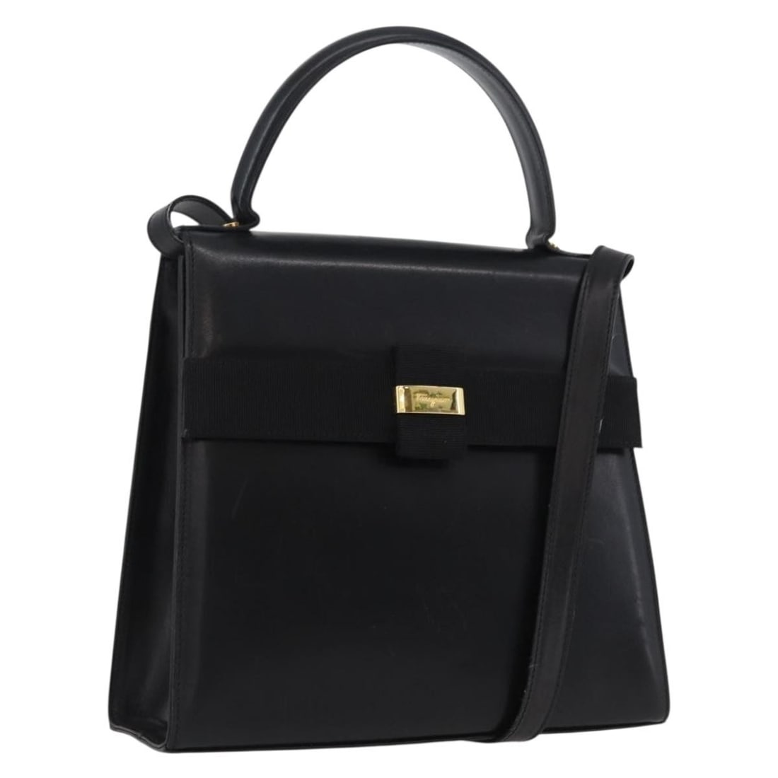 Black Leather Vara Ribbon Shoulder and Handbag by Salvatore Ferragamo: Black Leather Vara Ribbon Shoulder and Handbag by Salvatore Ferragamo This Salvatore Ferragamo Vara Ribbon 2-way handbag is crafted from black leather with gold-tone accents. The bag features both top