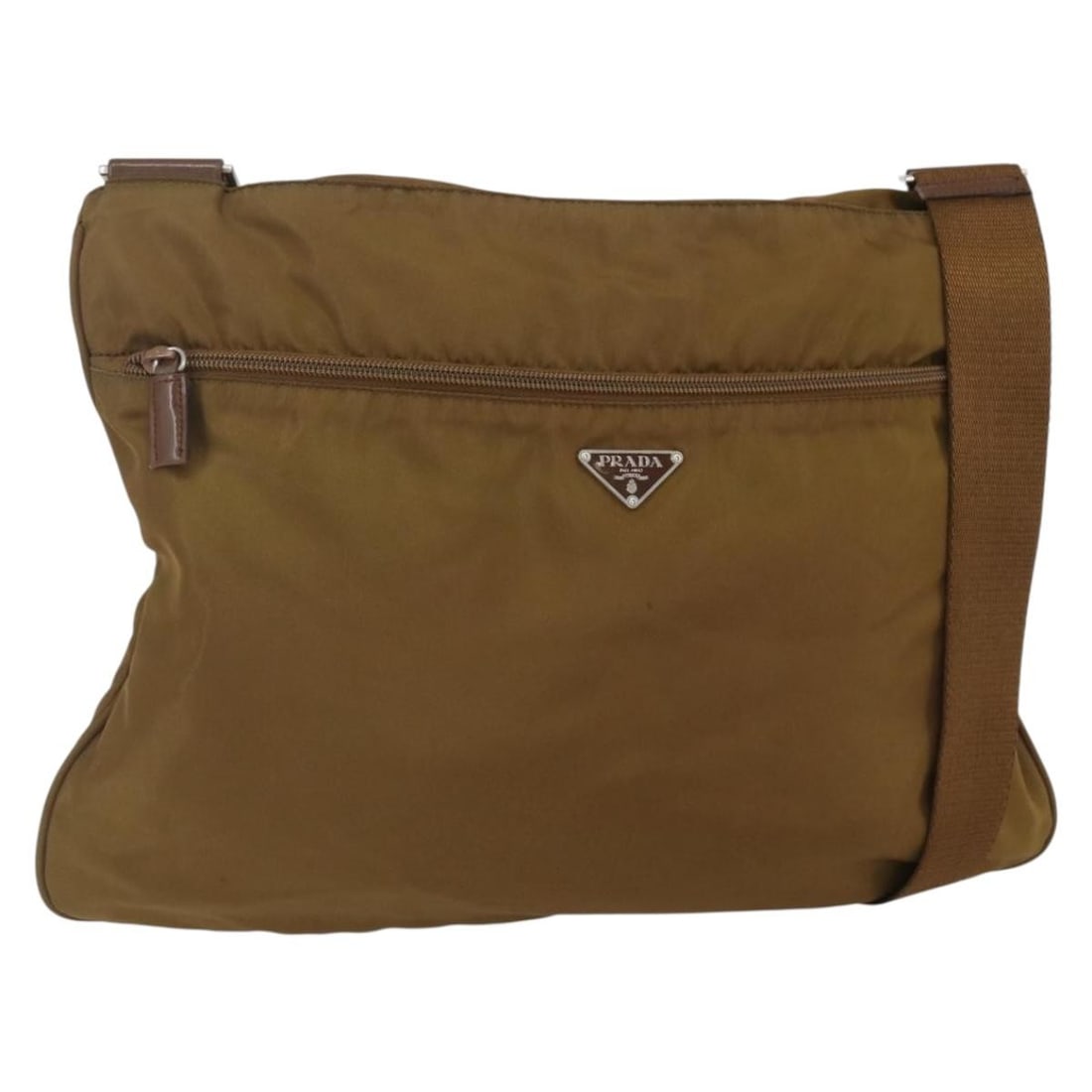 Prada Brown Nylon Shoulder Bag with Silver Tone Details and Guarantee Card: Prada Brown Nylon Shoulder Bag with Silver Tone Details and Guarantee Card This PRADA shoulder bag is crafted from brown nylon with silver-tone accents. Made in Italy, it features an adjustable strap