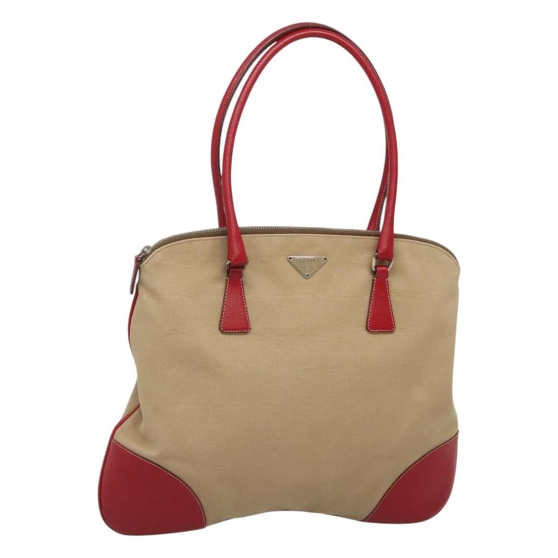 Prada Beige Canvas Silver Accent Women's Handbag Italy: Prada Beige Canvas Silver Accent Women's Handbag Italy This PRADA women's handbag is crafted from canvas in beige and silver tones. Made in Italy, the bag features a spacious interior and a handle dro