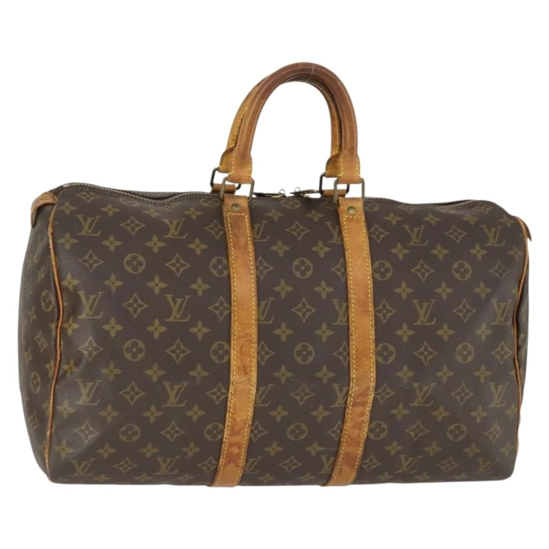 Keepall 45 Monogram Canvas Boston Bag by Louis Vuitton M41428: Keepall 45 Monogram Canvas Boston Bag by Louis Vuitton M41428 This Louis Vuitton Monogram Keepall 45 Boston Bag is crafted from signature monogram canvas with natural leather trim. The bag features st