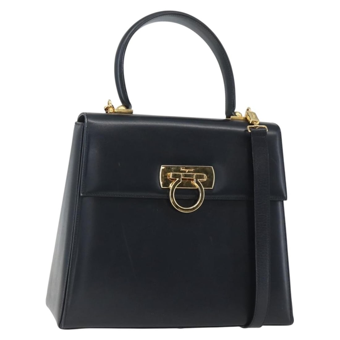 Navy Leather Gancini Shoulder and Handbag by Salvatore Ferragamo with Gold Accents: Navy Leather Gancini Shoulder and Handbag by Salvatore Ferragamo with Gold Accents This Salvatore Ferragamo Gancini handbag is crafted from navy leather and features gold-tone accents. Designed as a 2
