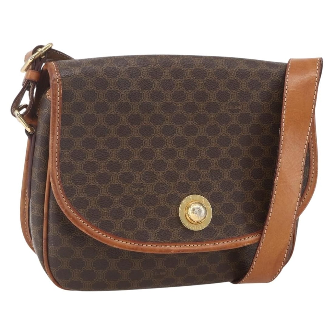 Celine Macadam Brown PVC Leather Shoulder Bag with Gold Accents: Celine Macadam Brown PVC Leather Shoulder Bag with Gold Accents This CELINE Macadam shoulder bag features a brown and gold PVC leather exterior with the signature Macadam canvas design. The bag is mad