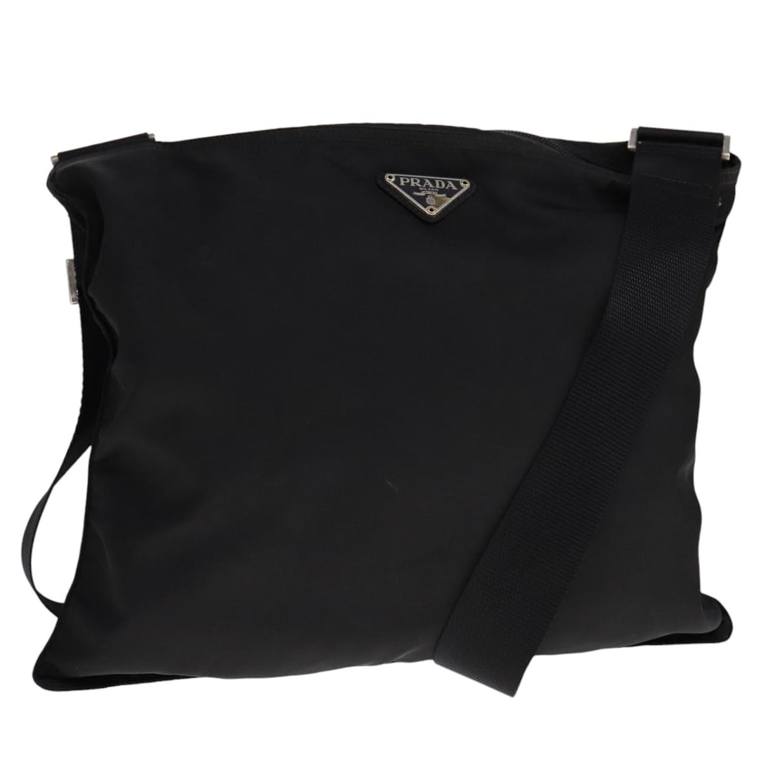 Black Nylon Prada Shoulder Bag for Women Made in Italy: Black Nylon Prada Shoulder Bag for Women Made in Italy This Prada shoulder bag is crafted from black nylon and features an adjustable shoulder strap. Designed for women, it offers a spacious interior