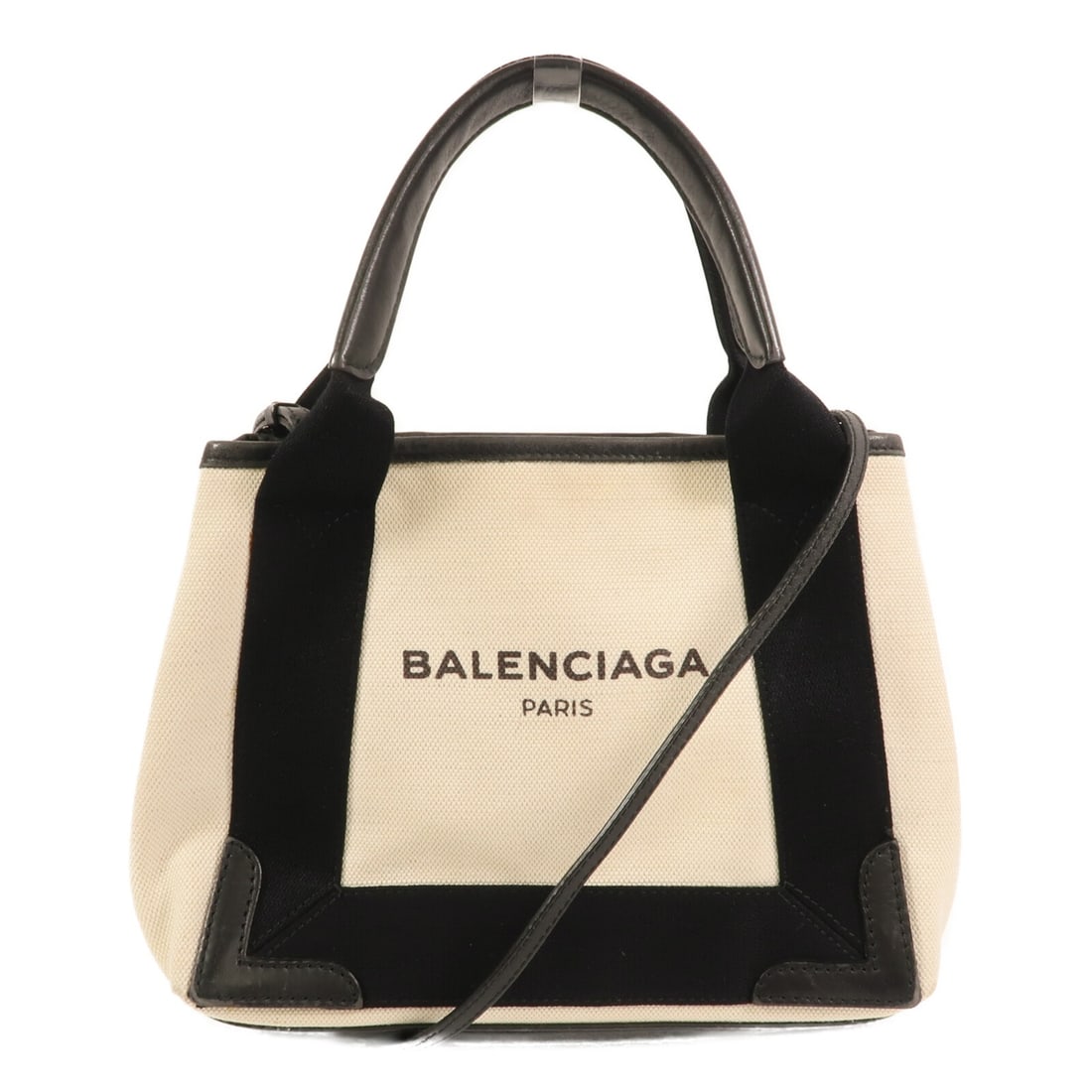 Balenciaga Navy Cabas Small Canvas Shoulder Bag with Silver Hardware White: Balenciaga Navy Cabas Small Canvas Shoulder Bag with Silver Hardware White This Balenciaga Navy Cabas Small 2 Way Shoulder Bag features a white canvas exterior and a versatile design that allows it to