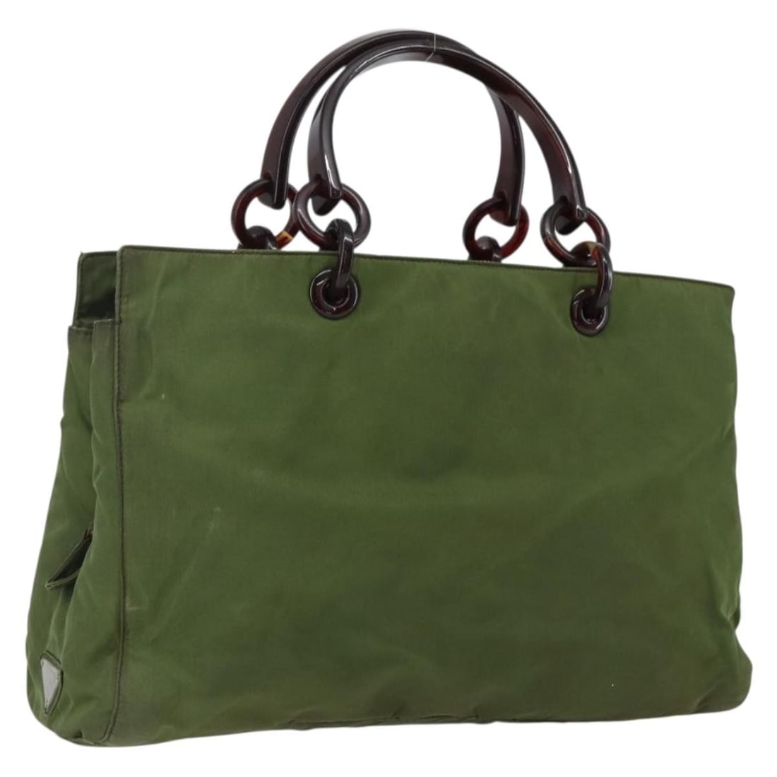 Green Nylon Prada Handbag Made in Italy: Green Nylon Prada Handbag Made in Italy This Prada hand bag features a green nylon exterior with a top handle, crafted in Italy. The bag shows signs of heavy use, including loss of shape, rubbing, sta