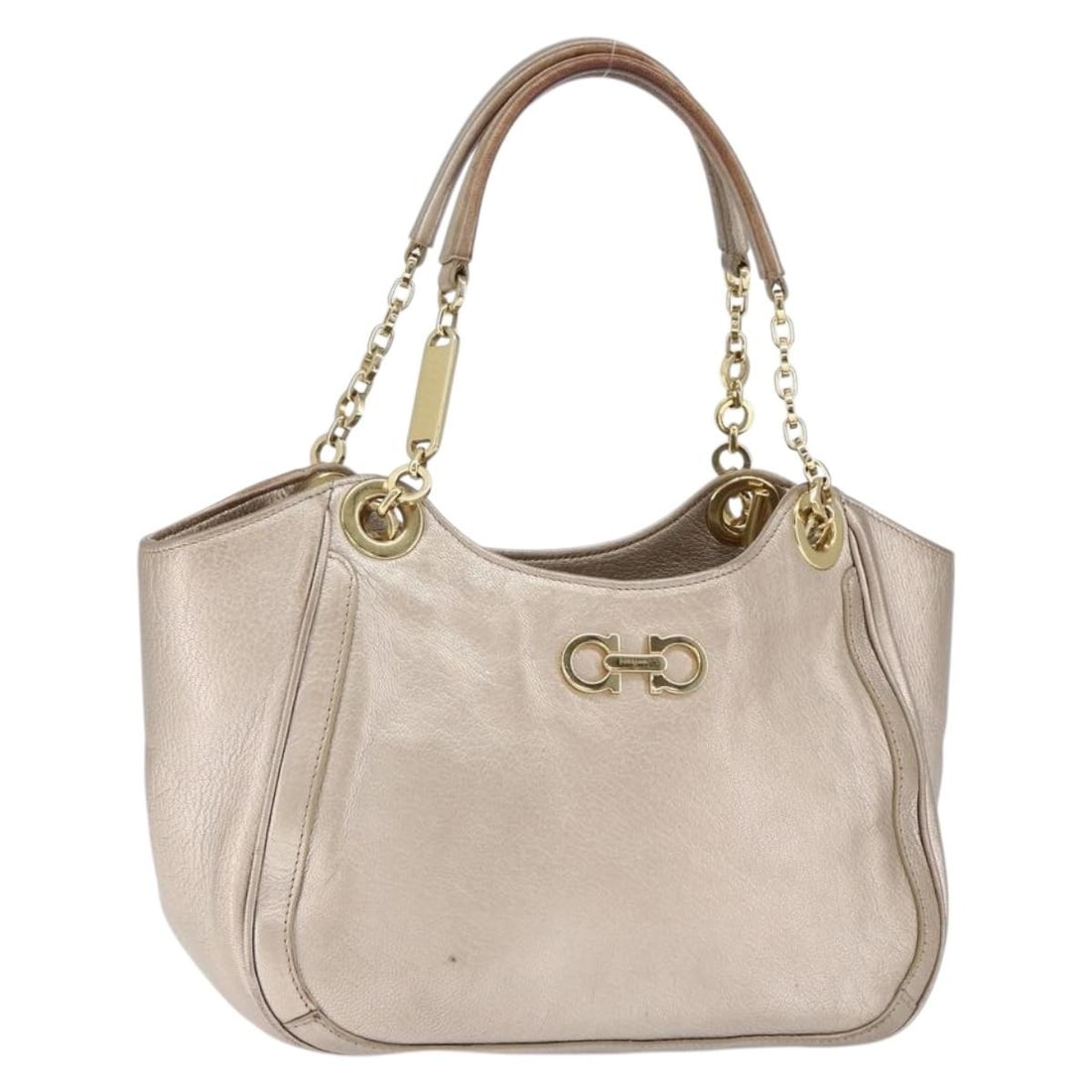 Salvatore Ferragamo Gancini Leather Hand Bag Gold Silver Authentic: Salvatore Ferragamo Gancini Leather Hand Bag Gold Silver Authentic This authentic Salvatore Ferragamo Gancini Hand Bag showcases exquisite Italian craftsmanship with a luxurious leather exterior in a