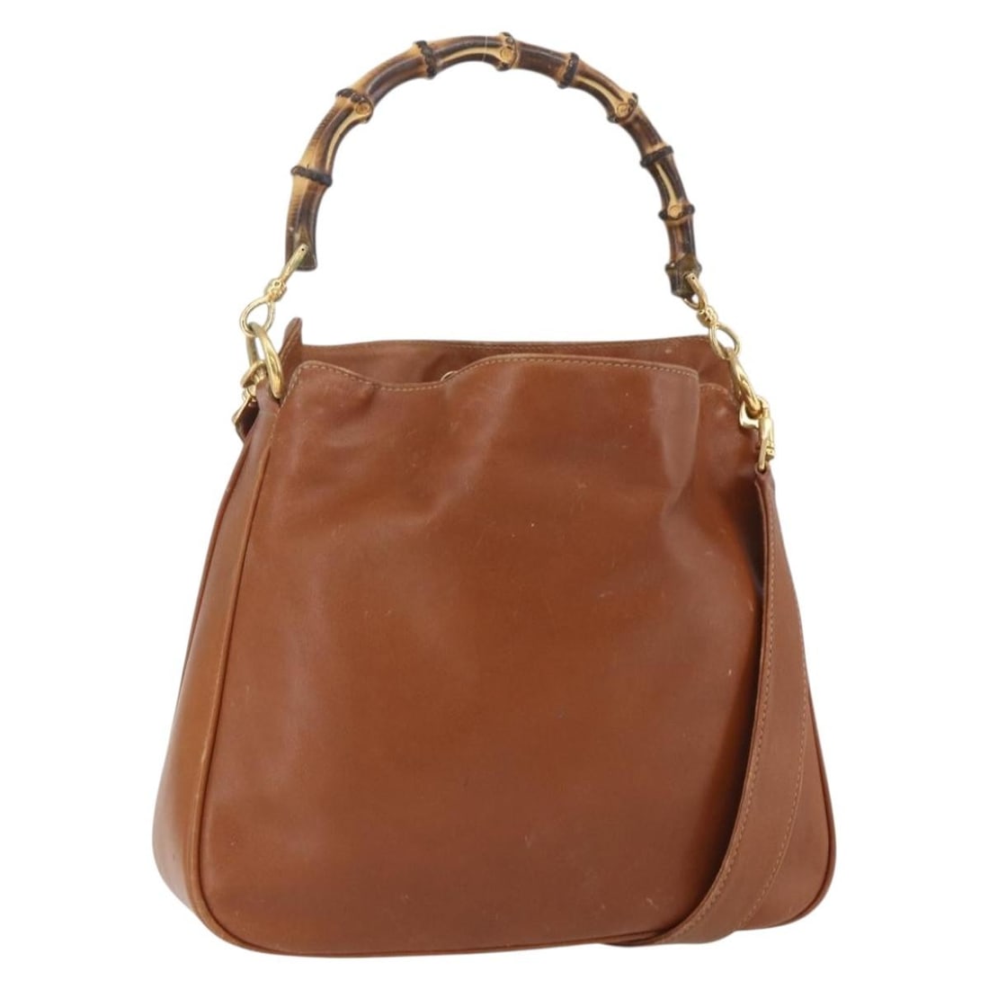 Brown Leather Gucci Bamboo 2way Handbag with Gold Accents and Strap: Brown Leather Gucci Bamboo 2way Handbag with Gold Accents and Strap This GUCCI Bamboo handbag features a two-way design crafted in brown leather with gold accents. The bag includes both a handle and a