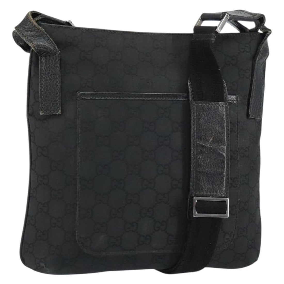 Black GG Canvas Gucci 293572 Shoulder Bag with Silver Accents: Black GG Canvas Gucci 293572 Shoulder Bag with Silver Accents This Gucci GG Canvas Shoulder Bag features a black and silver color scheme with signature GG canvas exterior. The bag is crafted in Italy