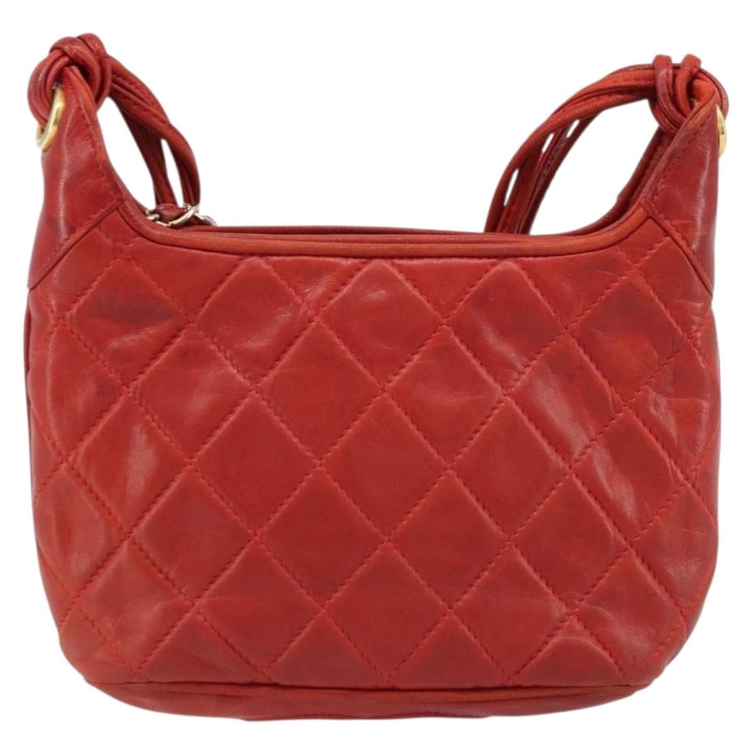 Quilted Leather Chanel Vintage Shoulder Bag with Tassel Red: Quilted Leather Chanel Vintage Shoulder Bag with Tassel Red This Chanel Vintage Tassel Shoulder Bag features a classic quilted leather design in red. It includes a tassel accent and a shoulder strap,