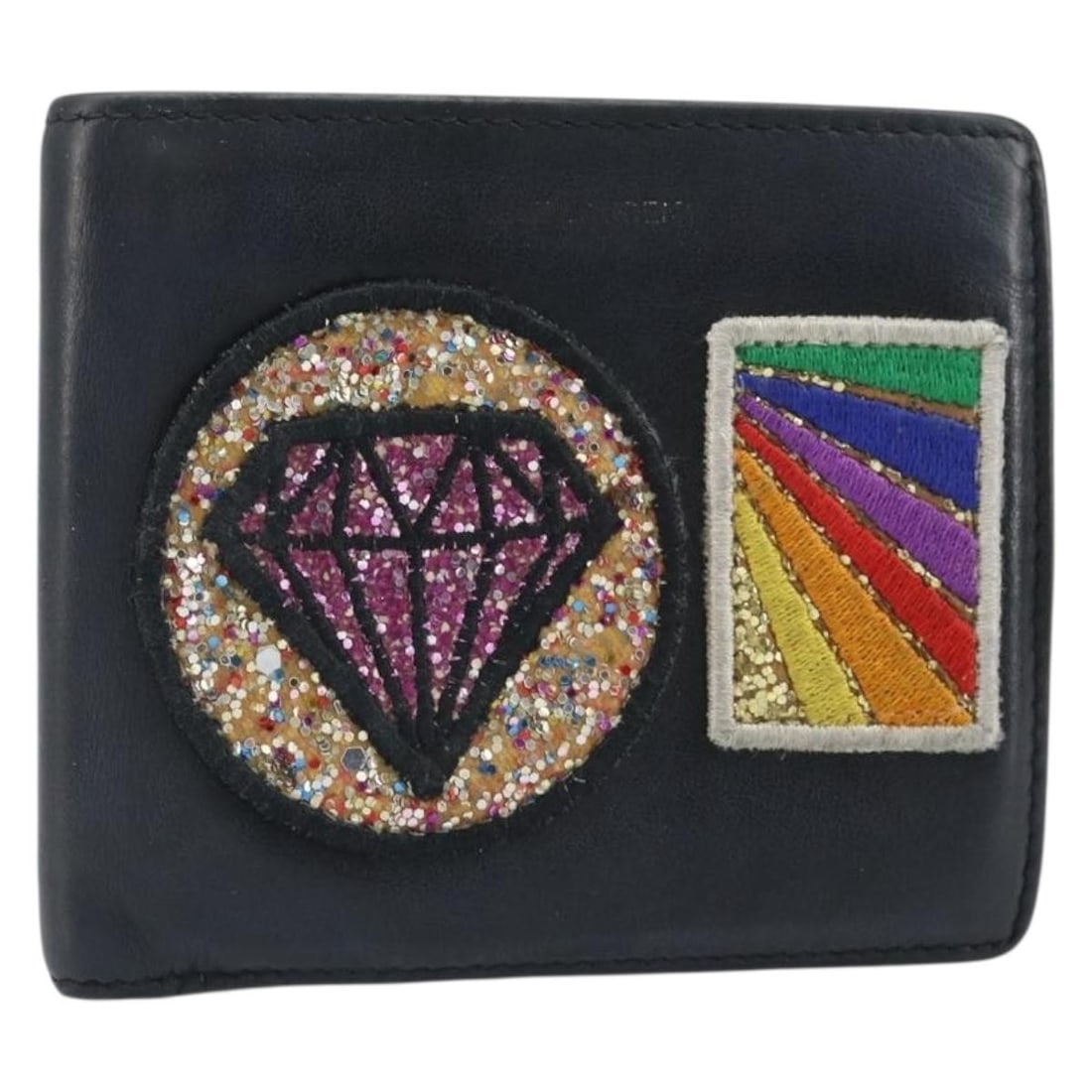 Black Leather Compact Wallet by Saint Laurent Made in Italy: Black Leather Compact Wallet by Saint Laurent Made in Italy This is a compact Saint Laurent wallet crafted from black leather. The wallet features a simple and functional design, with approximate meas