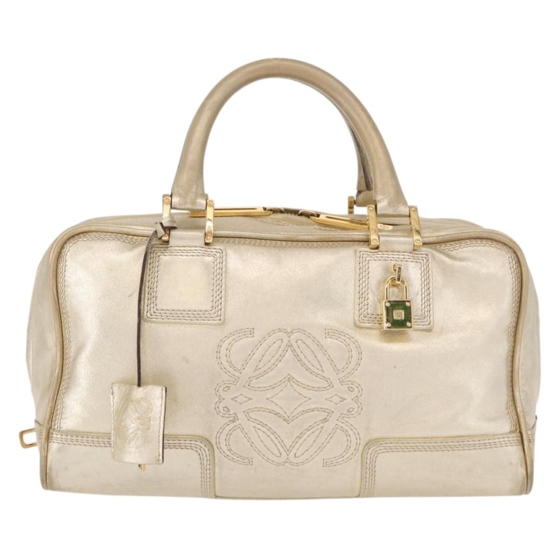 Loewe Amazona NM Leather Handbag in Gold 28cm by 16cm by 12cm: Loewe Amazona NM Leather Handbag in Gold 28cm by 16cm by 12cm This Loewe Amazona NM Bag is crafted from gold leather, designed for female use. It features a classic silhouette with a structured shape