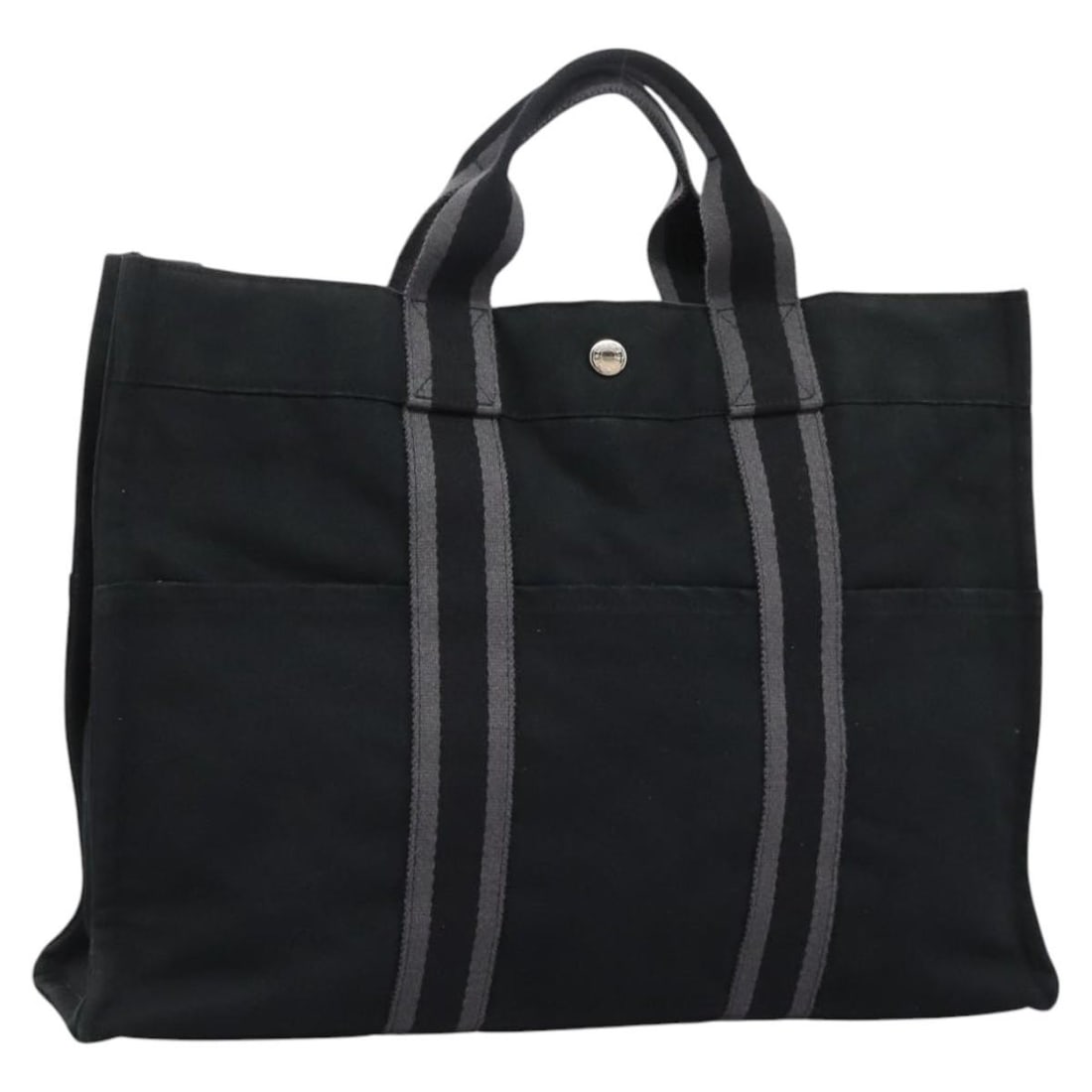 Hermes Fourre Tout MM Black Canvas Tote Bag for Women: Hermes Fourre Tout MM Black Canvas Tote Bag for Women This Hermes Fourre Tout MM handbag is crafted from black canvas and designed for women. The bag features a spacious interior, sturdy handles, and
