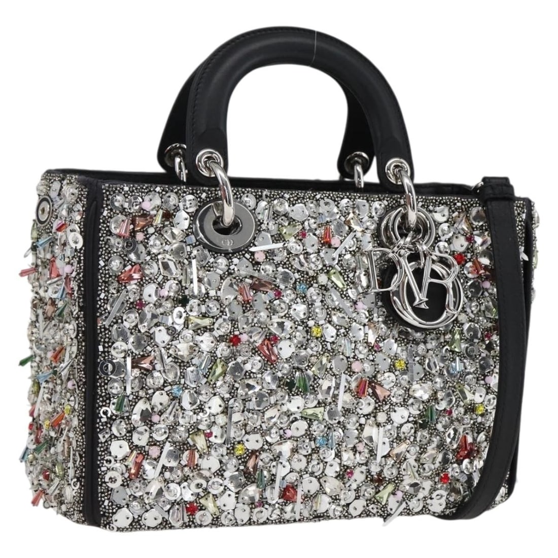 Lady Dior Black Leather Sequin Handbag with Silver Accents and Shoulder Strap: Lady Dior Black Leather Sequin Handbag with Silver Accents and Shoulder Strap This Christian Dior Lady Dior handbag features a black and silver leather exterior adorned with sequins. The bag offers ve