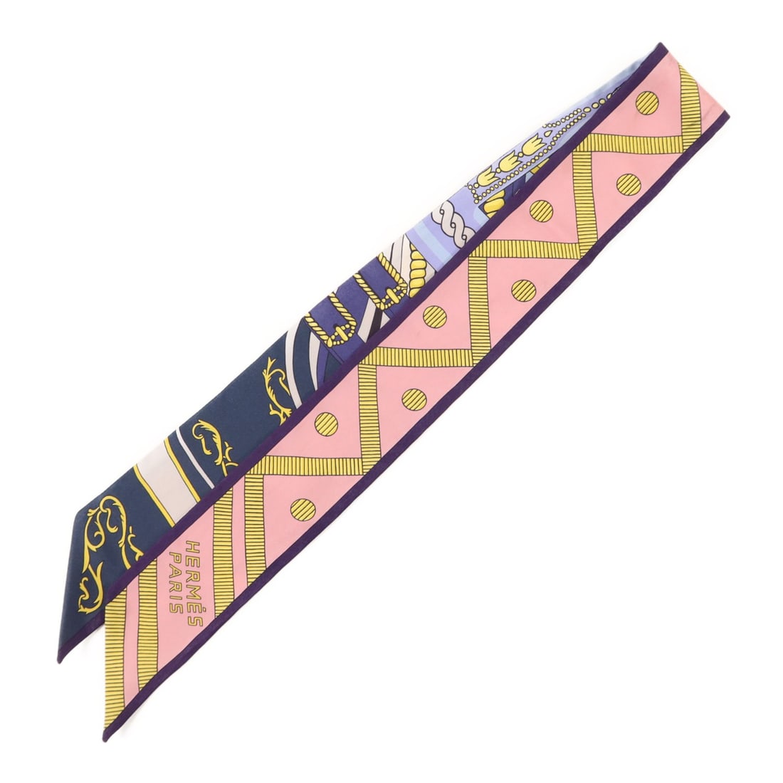Silk Twilly Scarf by Hermes in Multicolor Pink Yellow Blue: Silk Twilly Scarf by Hermes in Multicolor Pink Yellow Blue This Hermes Twilly scarf features a vibrant mix of pink, yellow, blue, and multicolor tones. Crafted from silk, it offers a luxurious feel an