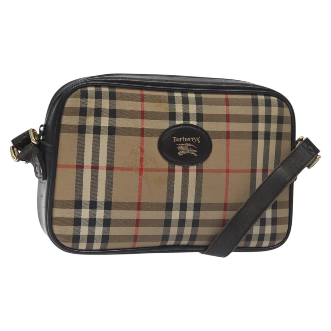 Burberrys Nova Check Beige Canvas Shoulder Bag Auth BA3222: Burberrys Nova Check Beige Canvas Shoulder Bag Auth BA3222 This Burberrys Nova Check Shoulder Bag showcases a classic design in a stylish beige canvas material. The bag features a spacious interior wi