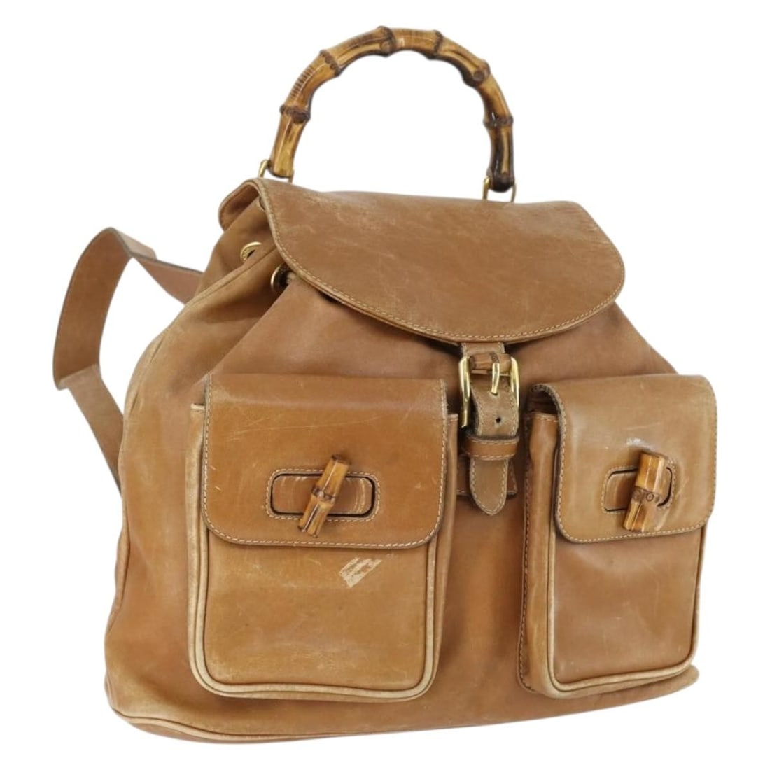 Beige Leather Gucci Bamboo Backpack Model 003 2058 0016 Italy: Beige Leather Gucci Bamboo Backpack Model 003 2058 0016 Italy This Gucci Bamboo Backpack features a beige and gold leather exterior. The bag is crafted in Italy and is part of the 003 2058 0016 produc