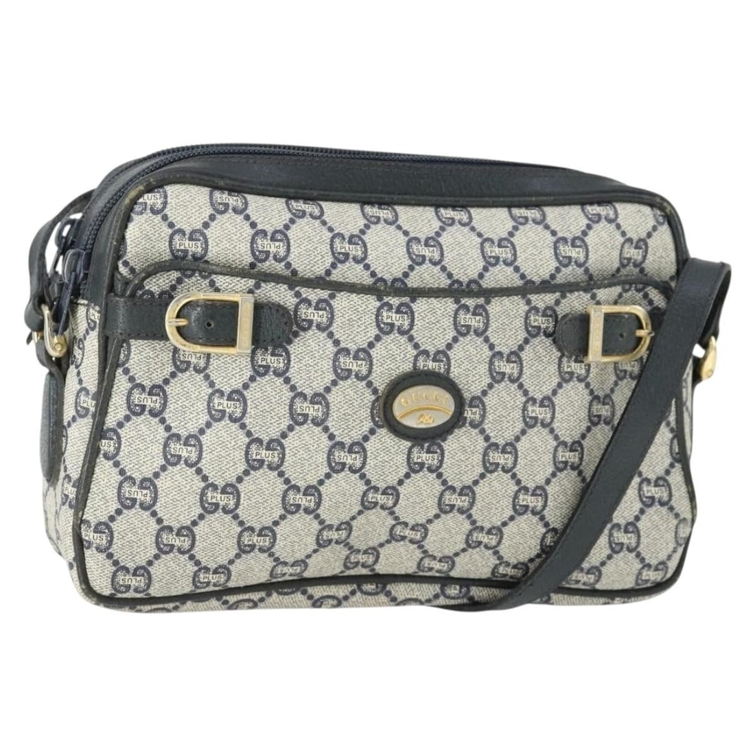 Gucci Supreme Navy PVC GG Plus Shoulder Purse Gold Accents: Gucci Supreme Navy PVC GG Plus Shoulder Purse Gold Accents This is a Gucci GG Plus Supreme shoulder bag crafted from navy and gold PVC leather with GG canvas detailing. Made in Italy, the bag features