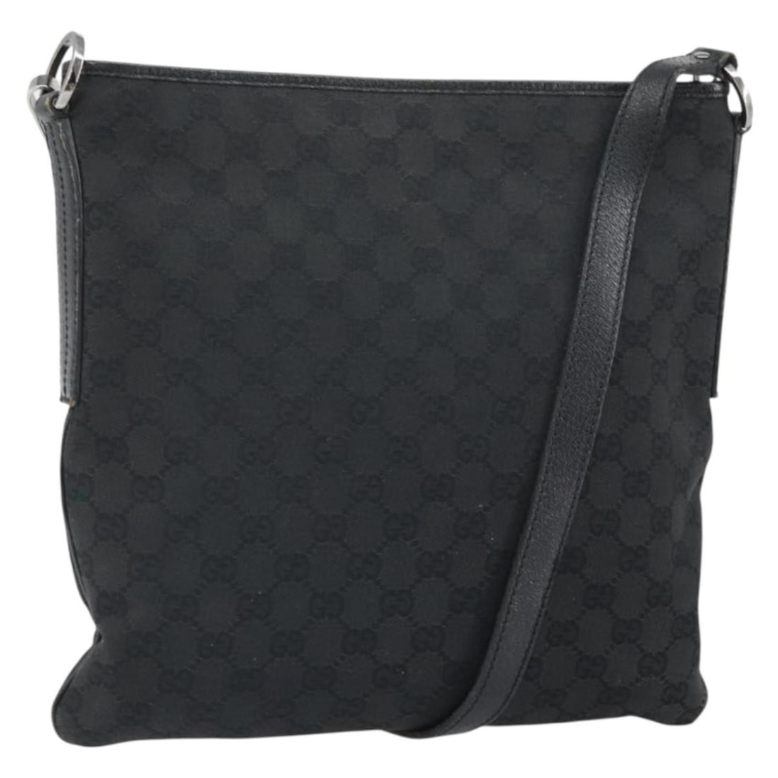 Black GG Canvas 113013 Shoulder Bag by Gucci with Silver Accents: Black GG Canvas 113013 Shoulder Bag by Gucci with Silver Accents This GUCCI GG Canvas shoulder bag features a classic black and silver design with the brand's signature GG canvas exterior. Crafted in