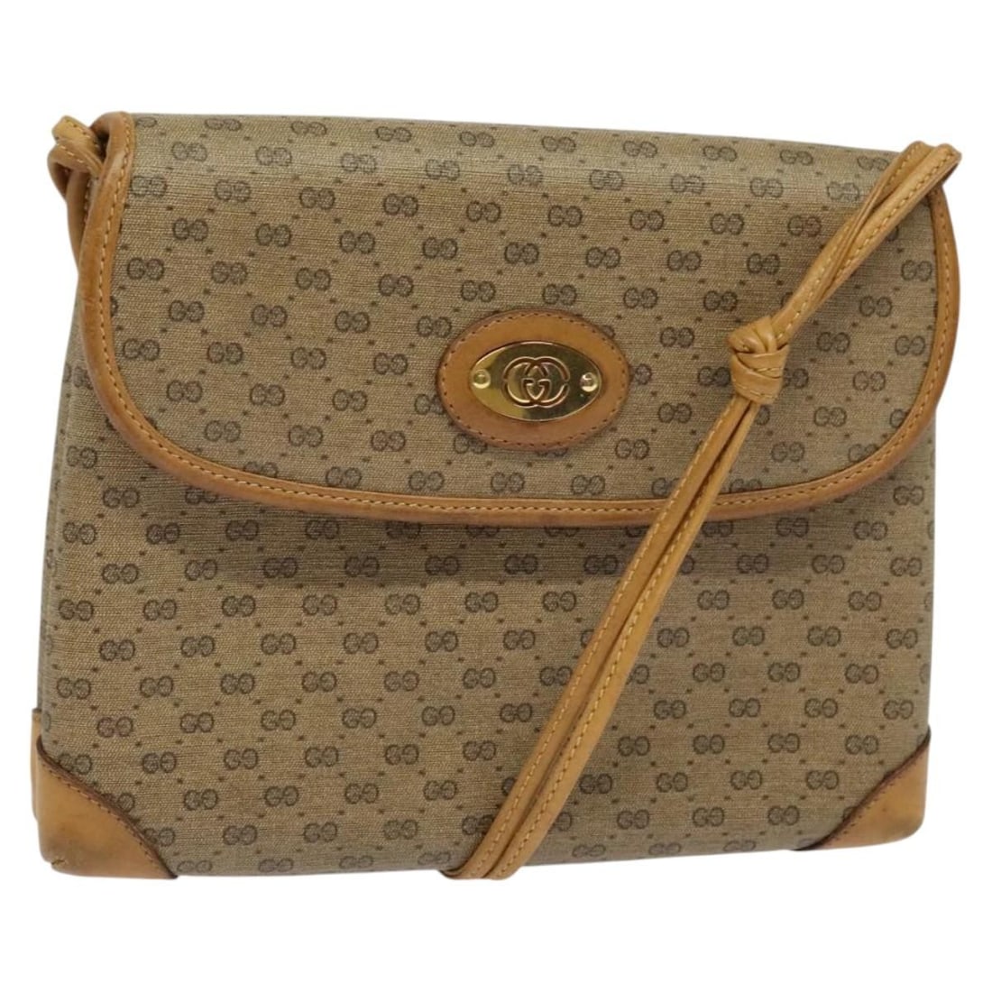 Beige Gold Micro GG Supreme 007 49 5548 Shoulder Bag by Gucci PVC Leather: Beige Gold Micro GG Supreme 007 49 5548 Shoulder Bag by Gucci PVC Leather This GUCCI Micro GG Supreme shoulder bag features a beige and gold PVC leather exterior combined with Micro Small GG canvas. D