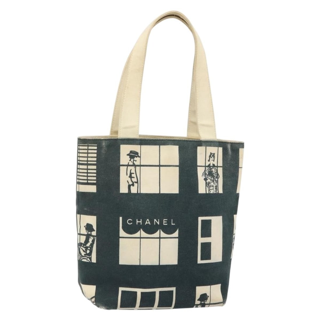Black and Gold Canvas CHANEL Tote Bag with CC Logo: Black and Gold Canvas CHANEL Tote Bag with CC Logo This CHANEL tote bag is crafted from black and gold canvas and features the iconic CC logo. Made in Italy, the bag offers a spacious interior with a