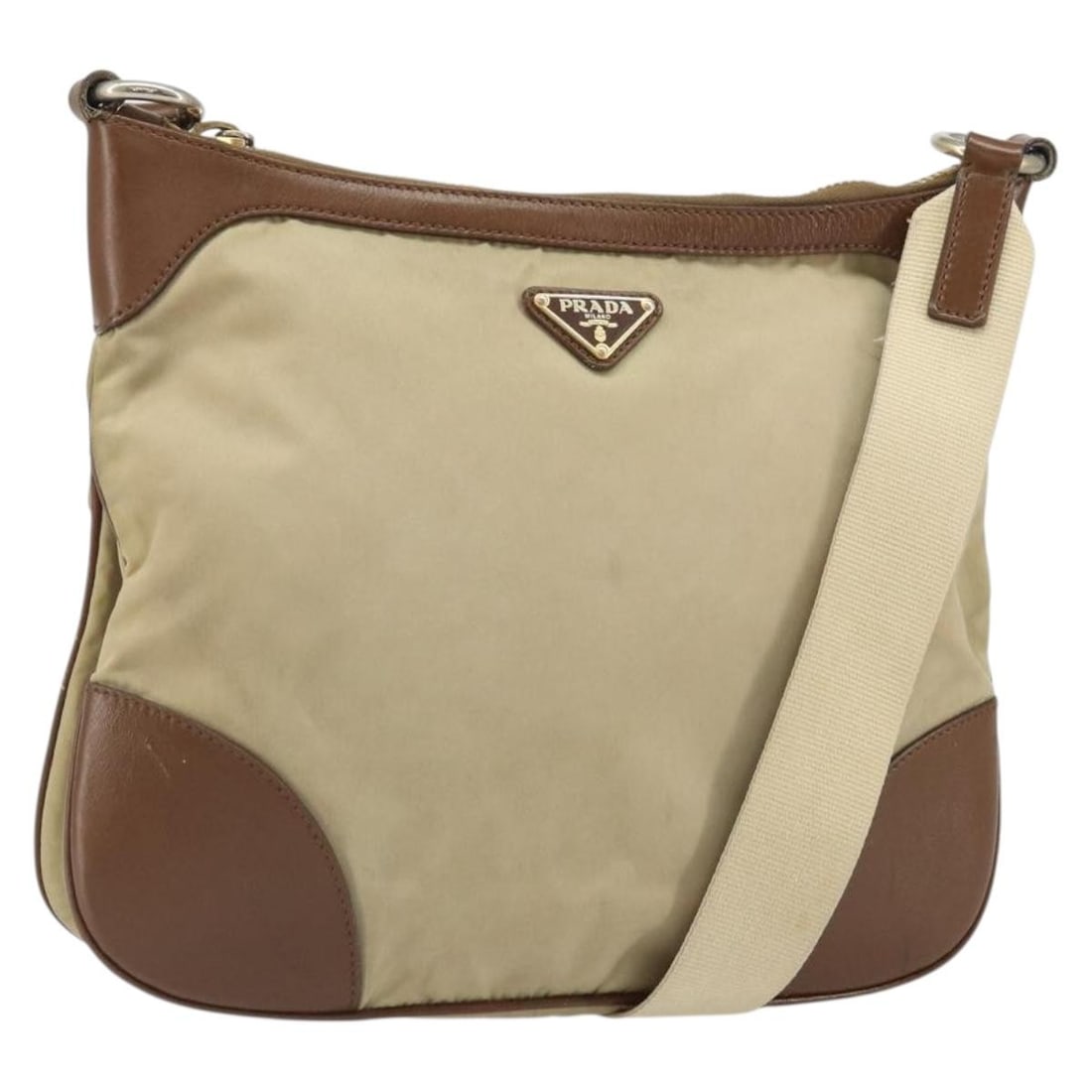 Prada Beige and Gold Nylon Shoulder Bag from Italy: Prada Beige and Gold Nylon Shoulder Bag from Italy This PRADA shoulder bag is crafted from beige and gold nylon and features a classic, minimalist design. The bag is made in Italy and includes an adju