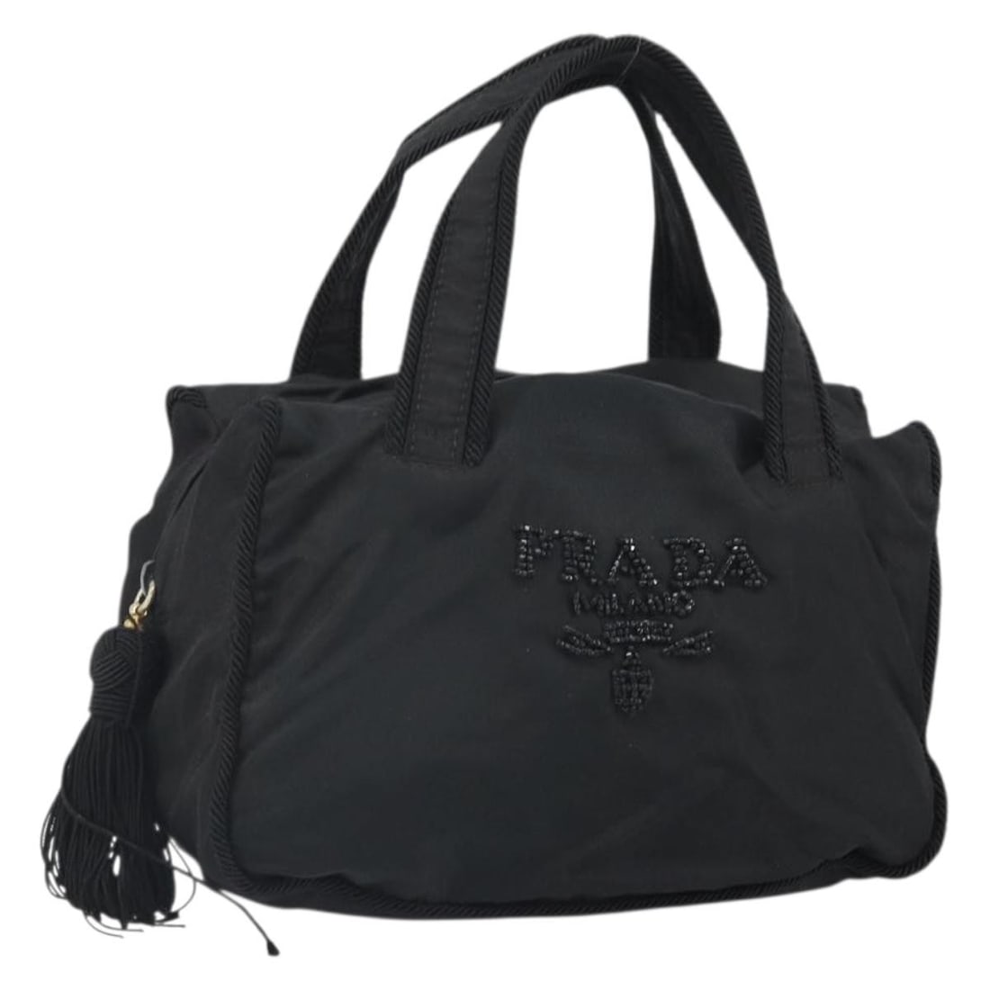 Black Nylon Prada Handbag with Gold Tone Hardware BS33258: Black Nylon Prada Handbag with Gold Tone Hardware BS33258 This Prada handbag features a black nylon exterior accented with gold hardware. It measures approximately 8.7 inches in length, 5.5 inches in