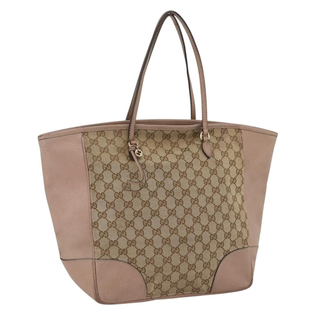 Beige Gold GG Canvas Brie Tote by Gucci 323671 Italy: Beige Gold GG Canvas Brie Tote by Gucci 323671 Italy This is a Gucci GG Canvas Brie tote bag in beige and gold. Crafted from signature GG canvas, it features dual top handles and a spacious interior d