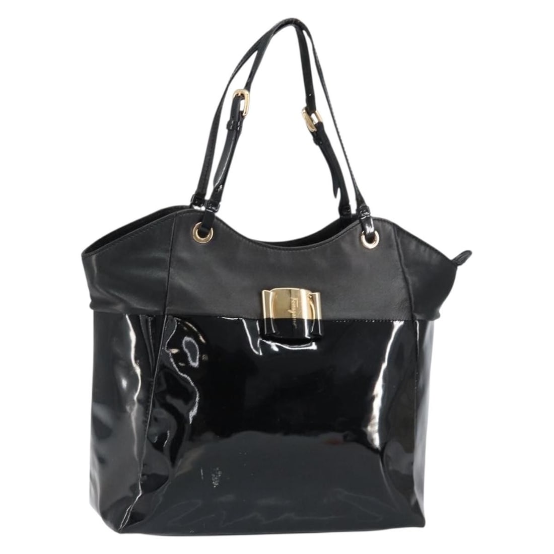 Salvatore Ferragamo Vala Tote Bag Black Gold Enamel Authentic BA8230: Salvatore Ferragamo Vala Tote Bag Black Gold Enamel Authentic BA8230 This Salvatore Ferragamo Vala Tote Bag is a stylish accessory crafted in Italy from high-quality enamel leather, featuring an elega