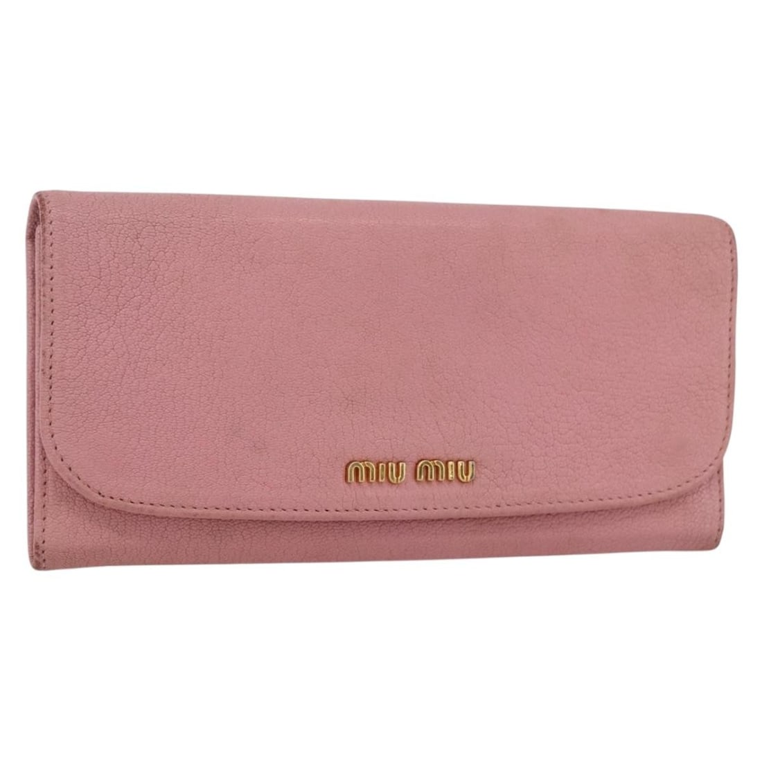 Pink Leather Long Wallet by Miu Miu for Women: Pink Leather Long Wallet by Miu Miu for Women This Miu Miu long wallet is crafted from pink leather and is designed for women. The wallet features a slim and elegant silhouette. It shows signs of use,