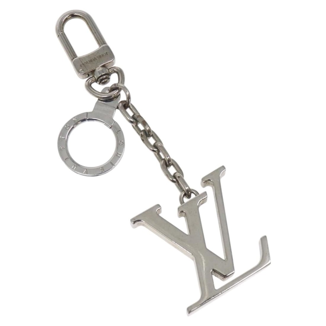 Silver Metal LV Initials Key Holder by Louis Vuitton M01192: Silver Metal LV Initials Key Holder by Louis Vuitton M01192 This Louis Vuitton key holder features printed LV initials and is crafted from silver-tone metal. Designed for women, it offers a compact an