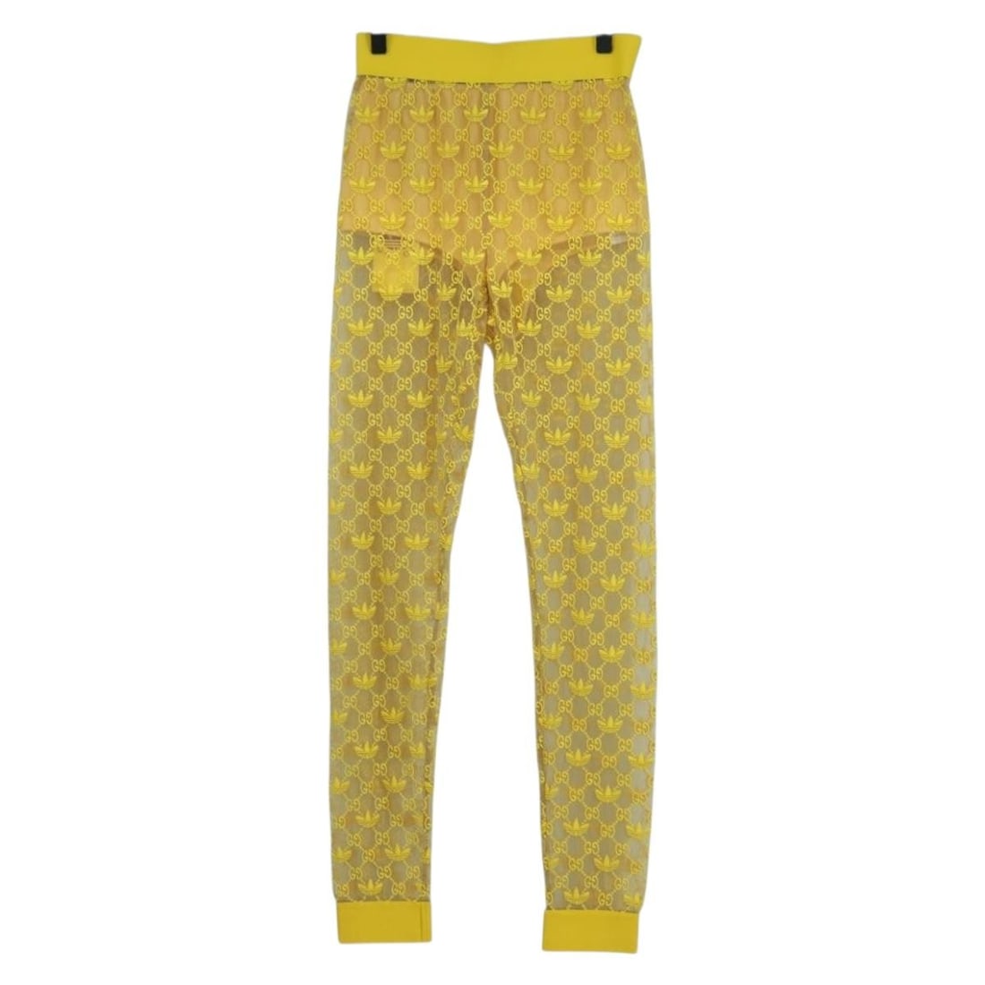 Gucci x Adidas Yellow GG Canvas Women's Tulle Pants Style 693446: Gucci x Adidas Yellow GG Canvas Women's Tulle Pants Style 693446 These women's pants are from the GUCCI x adidas collaboration, crafted from iconic GG Canvas in a striking yellow color. Made in Italy,