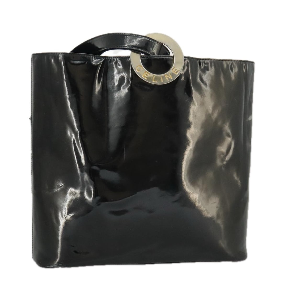 Black Enamel Shoulder Bag by CELINE Large Italian Purse: Black Enamel Shoulder Bag by CELINE Large Italian Purse This CELINE shoulder bag features a glossy black enamel exterior and is designed for women. The bag offers ample space with approximate measurem