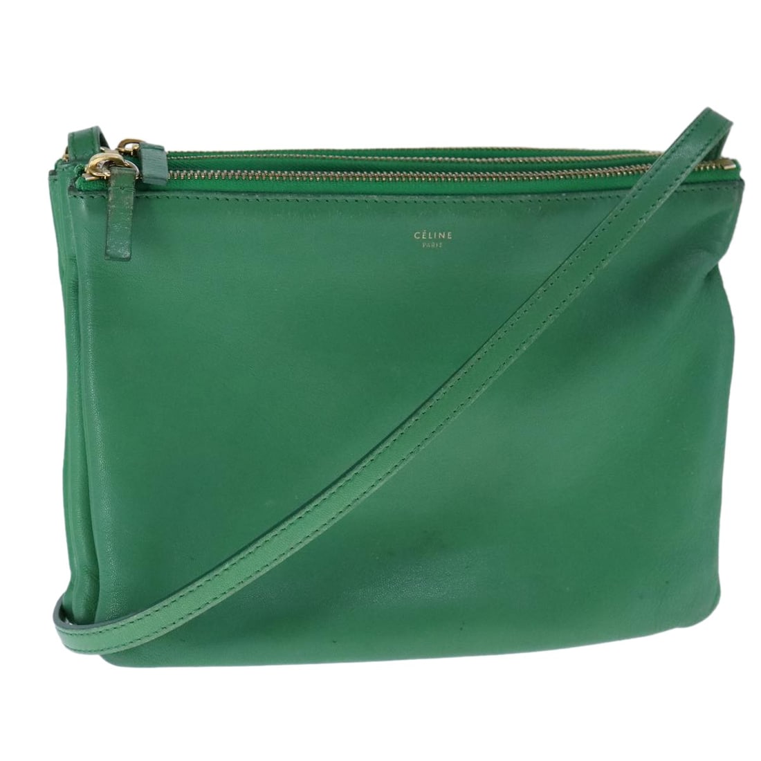 Celine Trio Green Leather Shoulder Bag with Gold Tone Details: Celine Trio Green Leather Shoulder Bag with Gold Tone Details This CELINE Trio Shoulder Bag features a green and gold leather exterior and is designed for women. The bag is made in Italy and has adjus