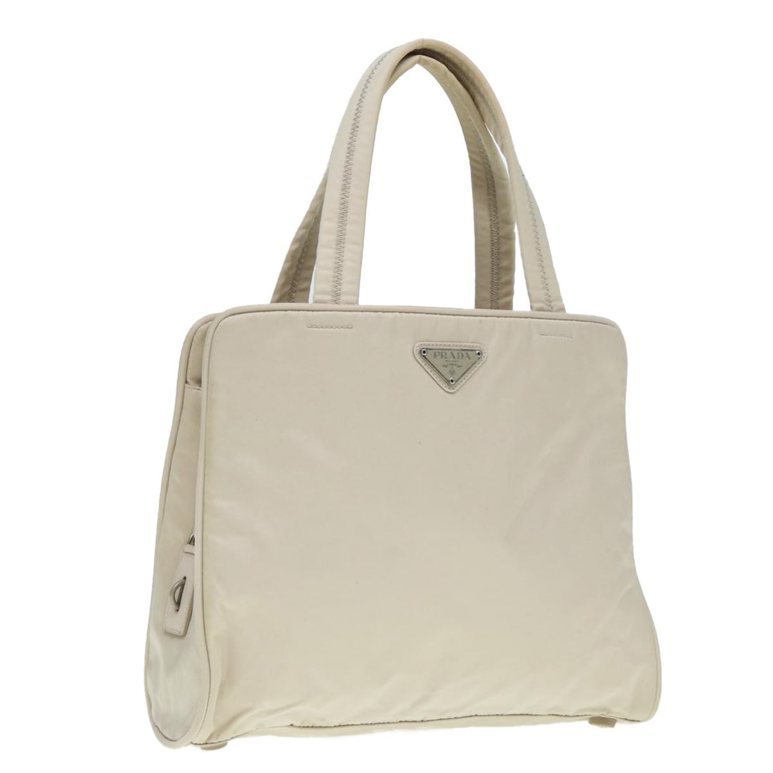 Prada Beige Nylon Women's Handbag with Silver Tone Accents: Prada Beige Nylon Women's Handbag with Silver Tone Accents This PRADA handbag is crafted from beige nylon with silver-tone accents, designed for women. Made in Italy, the bag features a structured sil