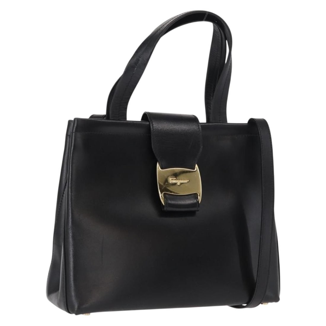 Black Leather Salvatore Ferragamo Vala Two Way Handbag with Gold Hardware: Black Leather Salvatore Ferragamo Vala Two Way Handbag with Gold Hardware This Salvatore Ferragamo Vala 2-way hand bag is crafted from black leather and features gold-tone accents. Designed for versat
