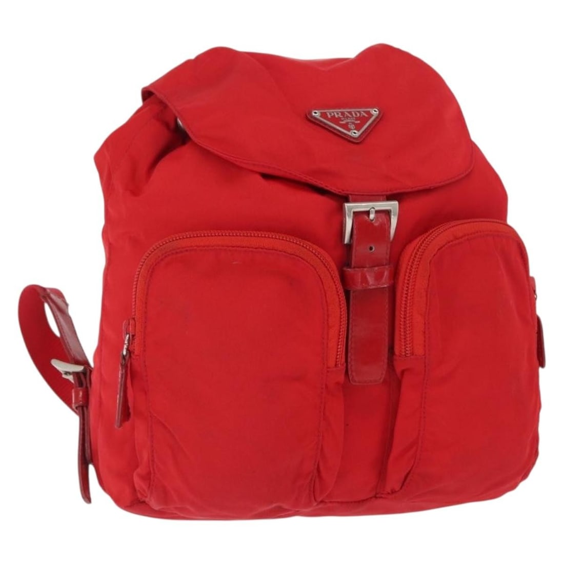 Red Nylon PRADA Backpack with Silver Accents for Women: Red Nylon PRADA Backpack with Silver Accents for Women This PRADA women's backpack features a red and silver nylon exterior with silver-tone hardware. Made in Italy, it offers a stylish and functional