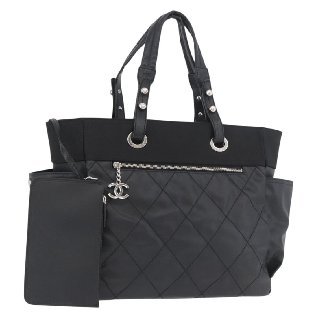 Chanel Paris Biarritz GM Black Coated Canvas Tote with Pouch: Chanel Paris Biarritz GM Black Coated Canvas Tote with Pouch This is a CHANEL Paris Biarritz GM Tote Bag crafted from black and silver coated canvas. Designed for women, the tote features a spacious i