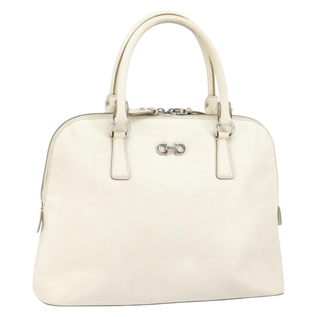White Leather Salvatore Ferragamo Women's Handbag with Silver Accents: White Leather Salvatore Ferragamo Women's Handbag with Silver Accents This Salvatore Ferragamo handbag is crafted from white and silver leather and designed for women. The bag features a structured si
