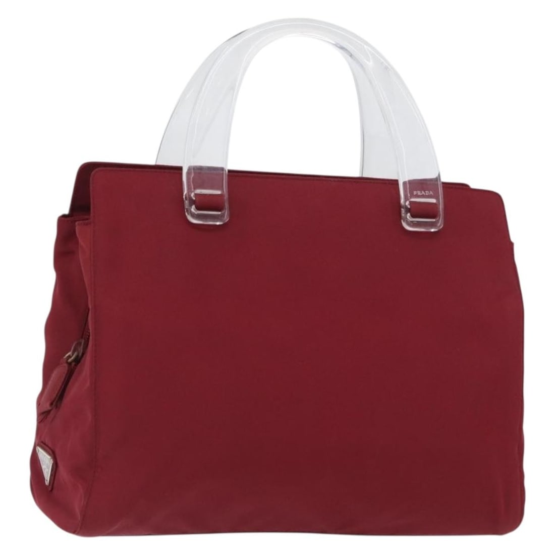 Red Nylon Prada Handbag Made in Italy with Guarantee Card: Red Nylon Prada Handbag Made in Italy with Guarantee Card This red Prada handbag is crafted from durable nylon and features a classic design with a drop handle. Made in Italy, it includes a guarantee