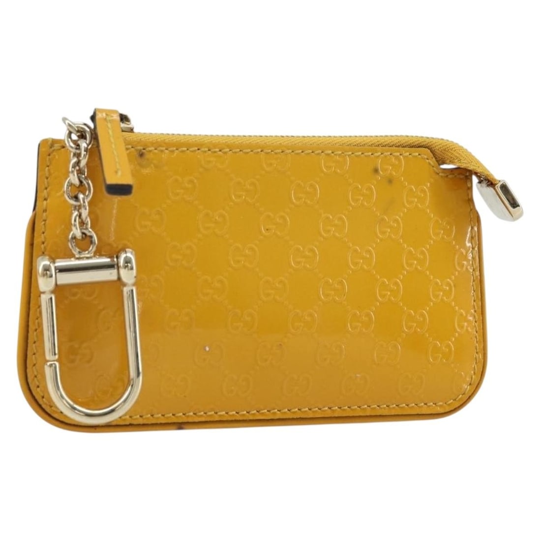 Yellow Micro GG Canvas PVC Coin Purse by Gucci Model 233183: Yellow Micro GG Canvas PVC Coin Purse by Gucci Model 233183 This GUCCI Micro GG Canvas Guccissima coin purse is crafted from yellow PVC leather with the signature micro GG canvas. Designed for women,