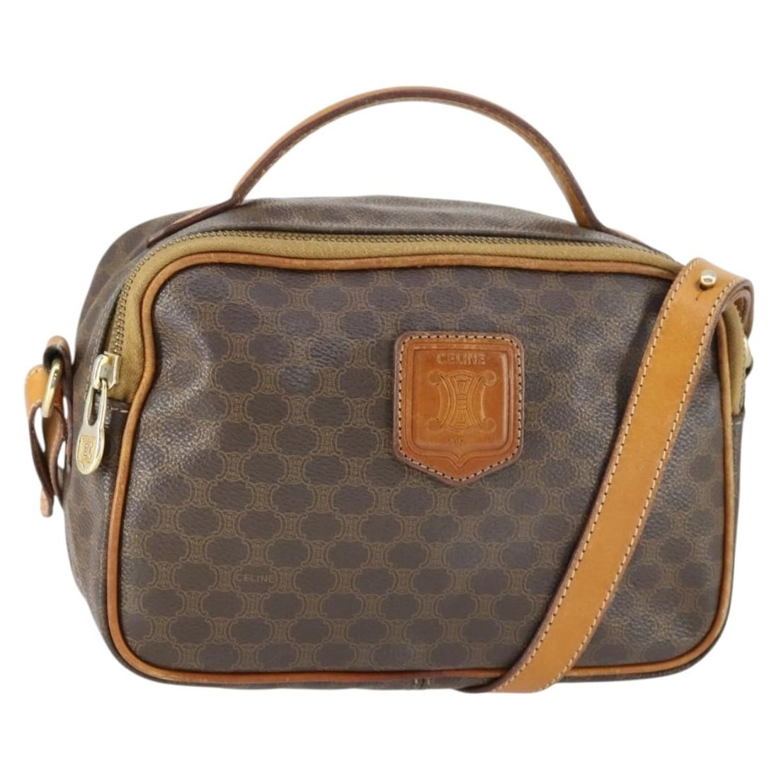 Celine Macadam Brown PVC Leather Shoulder Bag with Gold Accents and 2-Way Strap: Celine Macadam Brown PVC Leather Shoulder Bag with Gold Accents and 2-Way Strap This CELINE Macadam Canvas shoulder bag features a classic brown and gold design crafted from PVC leather and Macadam ca