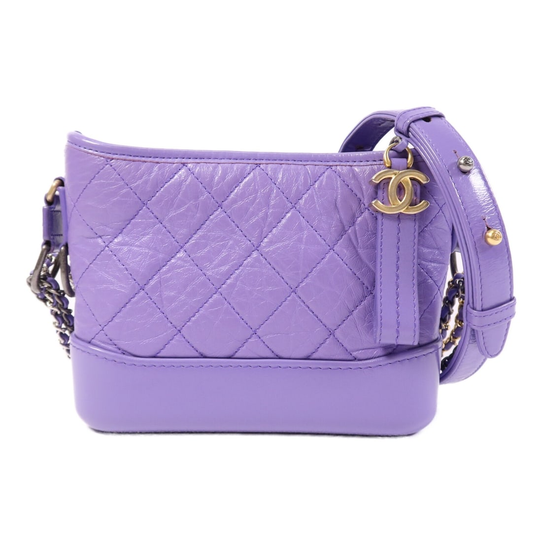 Gabrielle Small Purple Calfskin Chain Shoulder Bag by CHANEL: Gabrielle Small Purple Calfskin Chain Shoulder Bag by CHANEL This CHANEL Gabrielle Small Chain Shoulder Bag features luxurious calfskin leather in a striking purple hue. Designed as a classic shoulder