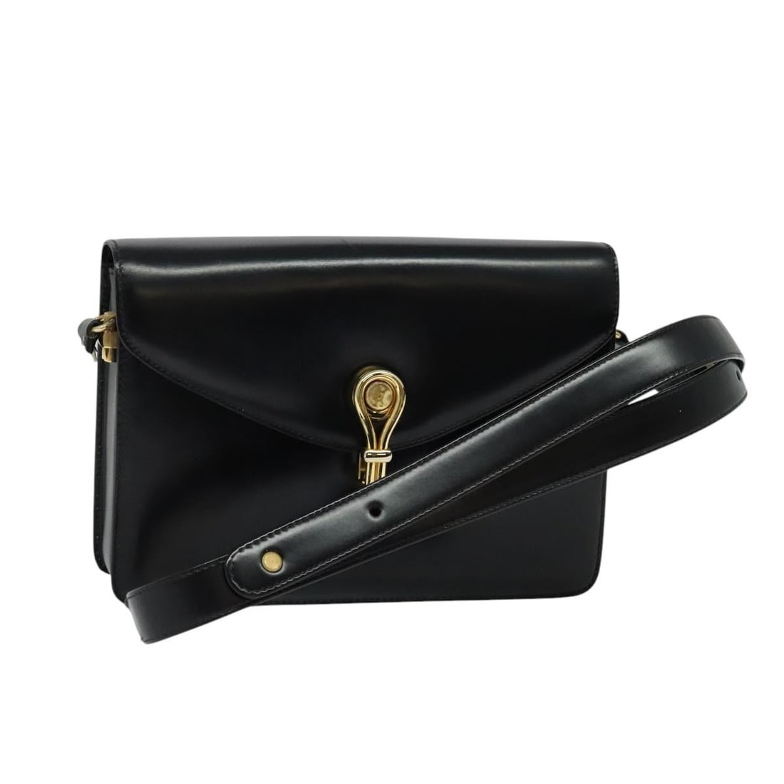 Black Leather Gucci Shoulder Purse with Gold Accents 001 109 0436: Black Leather Gucci Shoulder Purse with Gold Accents 001 109 0436 This GUCCI shoulder bag is crafted from black leather with gold-tone accents. Made for women, it features a compact silhouette and is