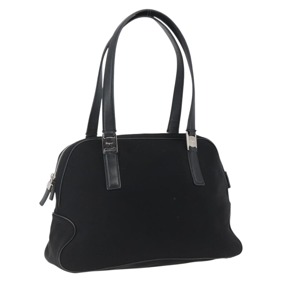 Salvatore Ferragamo Black Nylon Women's Handbag with Silver Accents: Salvatore Ferragamo Black Nylon Women's Handbag with Silver Accents This Salvatore Ferragamo hand bag is crafted from black nylon with silver-tone details. Designed for women, it features a spacious m