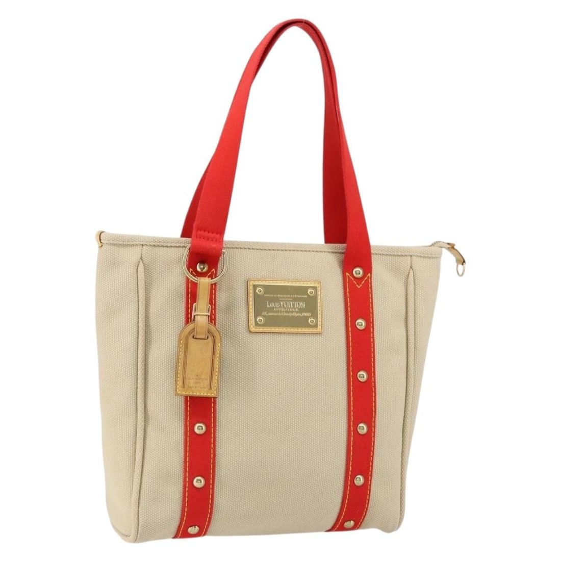LOUIS VUITTON Antigua Cabas MM Tote Bag Beige Red Canvas M40035 Auth: LOUIS VUITTON Antigua Cabas MM Tote Bag Beige Red Canvas M40035 Auth The LOUIS VUITTON Antigua Cabas MM Tote Bag is a stylish and practical accessory crafted from durable canvas, featuring a chic comb