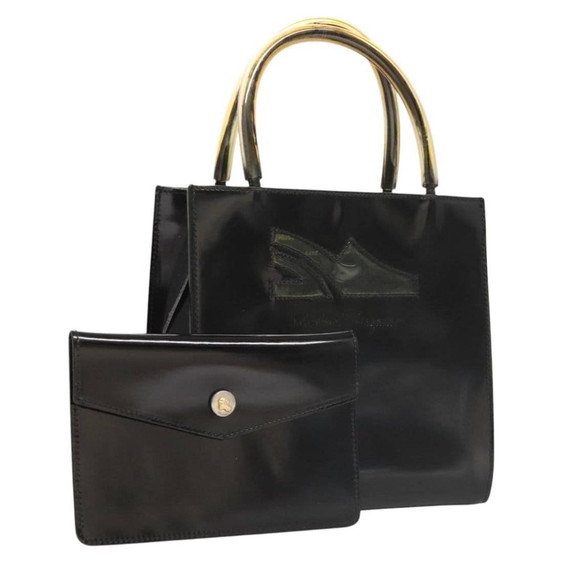Salvatore Ferragamo Black Patent Leather Handbag with Pouch: Salvatore Ferragamo Black Patent Leather Handbag with Pouch This Salvatore Ferragamo handbag is crafted from black patent leather, designed for women. It features a structured silhouette with a top ha